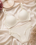 Ivory Bloom Set flat lay — temporary concept image
